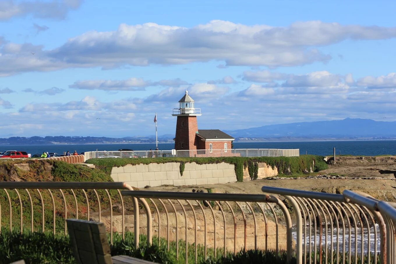 The red-brick lighthouse on West Cliff Drive in Santa Cruz, above the ocean.